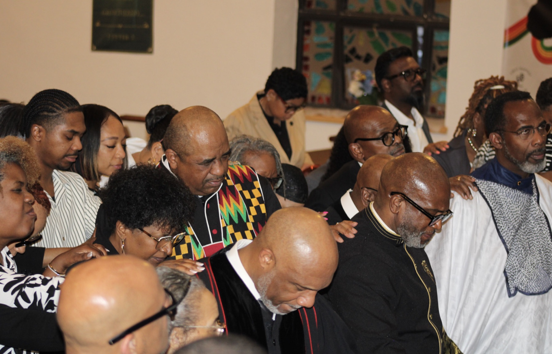 CHL Health Navigators, Clergy, health workers, and mental health workers receiving the Blessing of the Healers