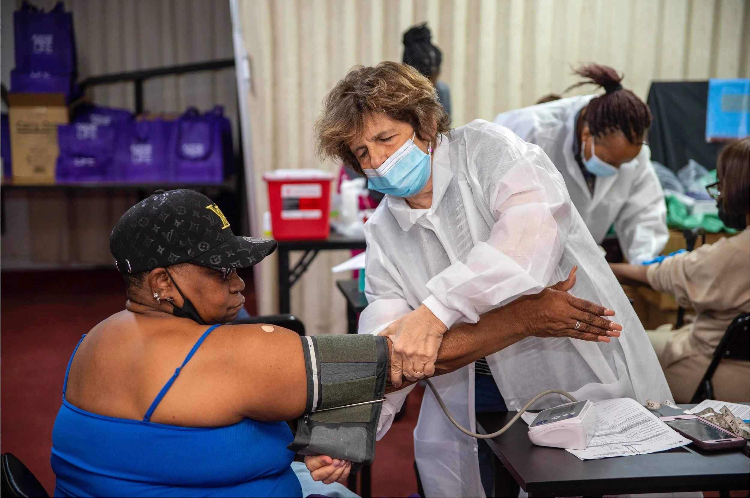 Health worker administering care