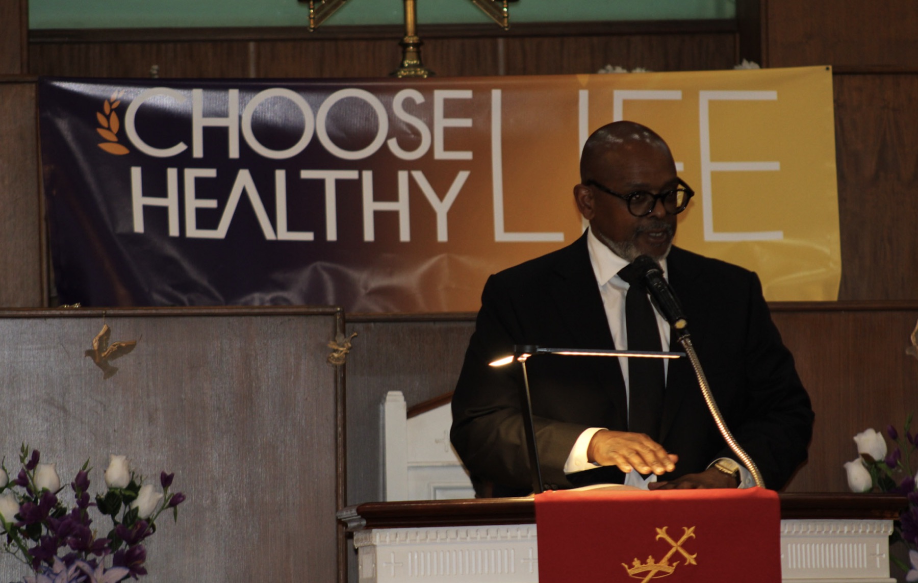 Host Pastor Rev. Patrick H. Young (First Baptist Church of East Elmhurst) addresses the audience