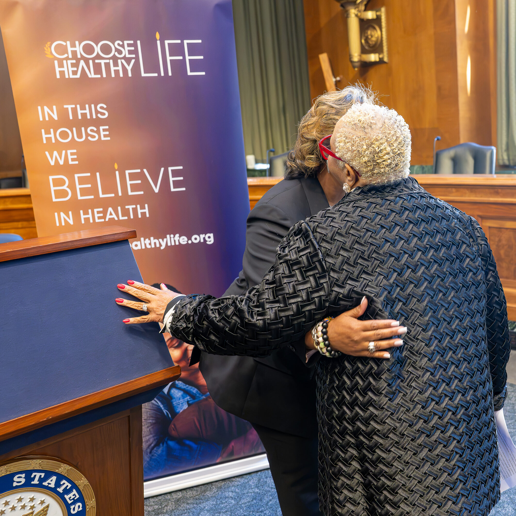 Rev. Kimberly L. Williams welcomes CHL Founder & Board Chair Debra Fraser-Howze to the podium