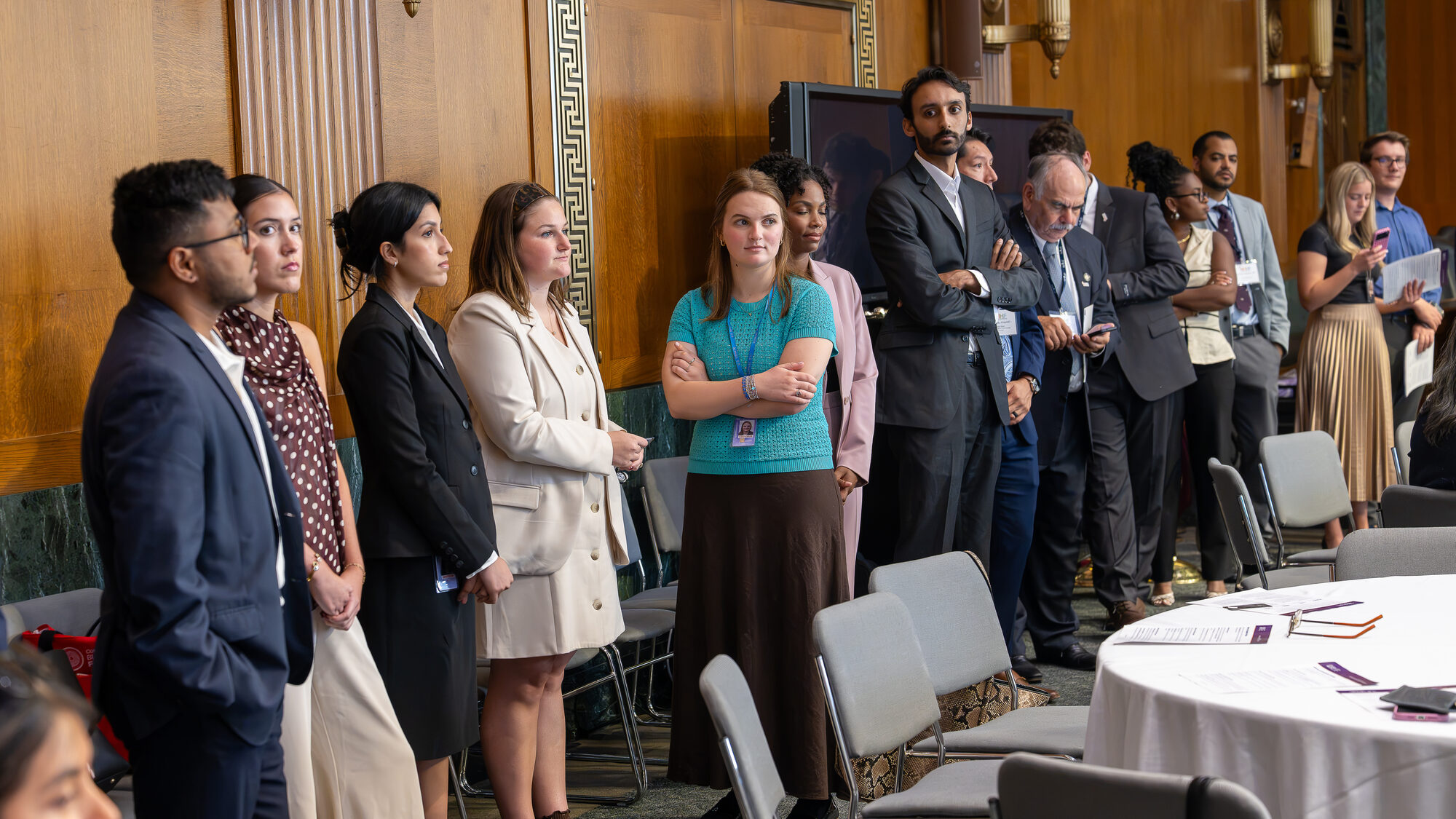 Congressional staffers listen to remarks