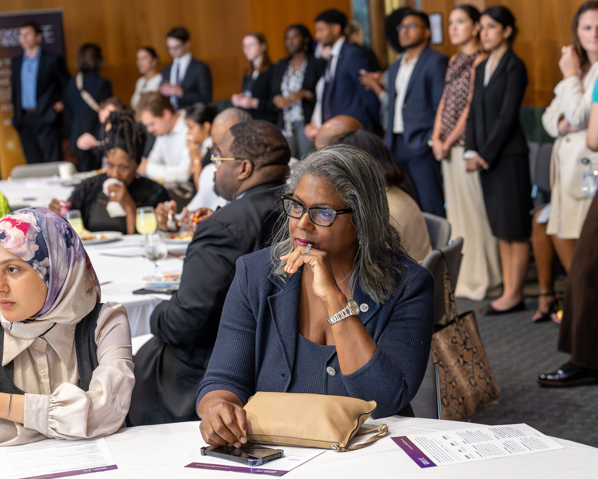 Congressional staffers listen to remarks
