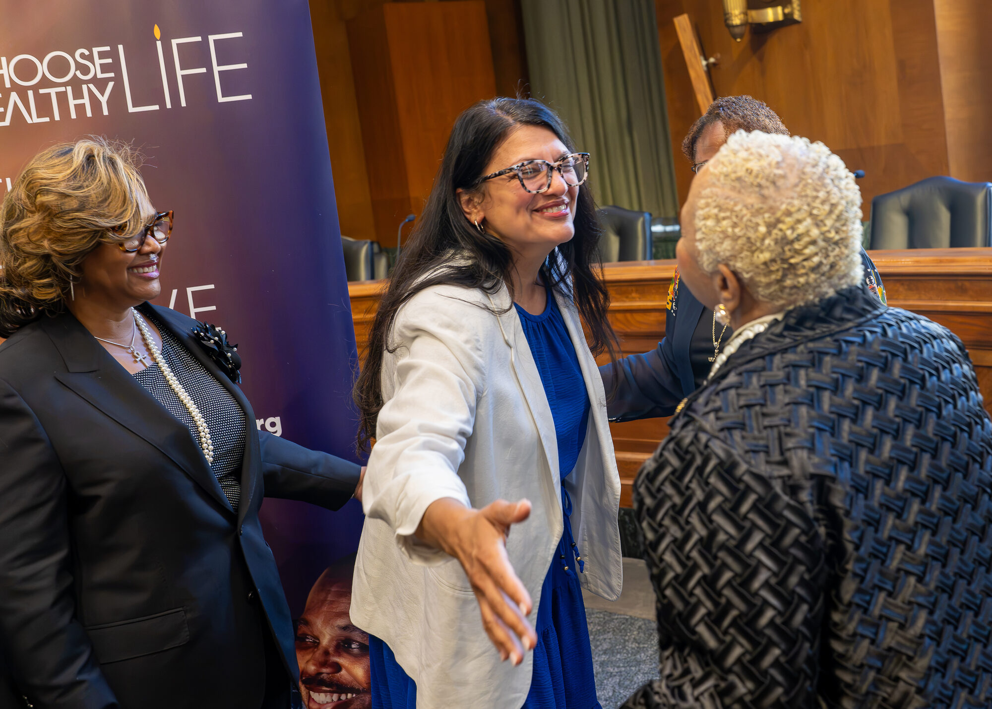 Rep. Rashida Tlaib greets CHL Founder & Board Chair Debra Fraser-Howze