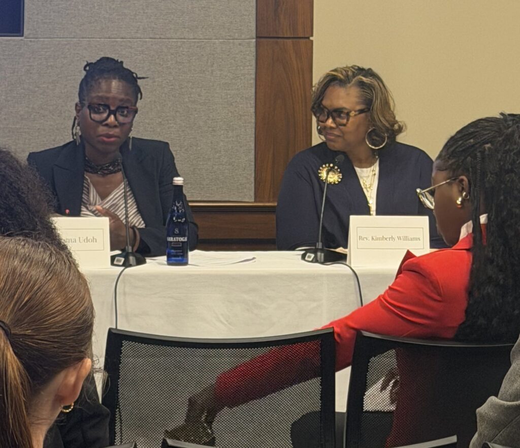 Dr. Ifeoma C. Udoh and Rev. Kimberly L. Williams seated at the panel table